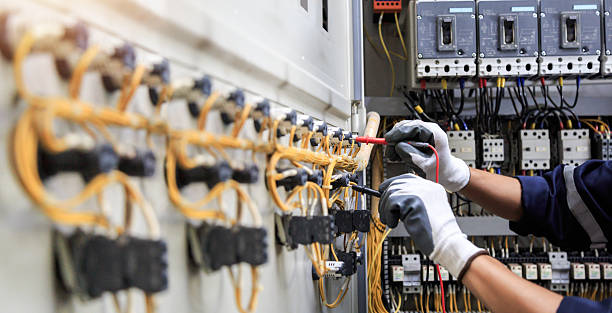 Professional Electrician technician working in Champaign, IL